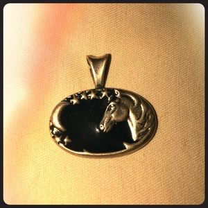 Silver horse head scene pendant with dark enamel